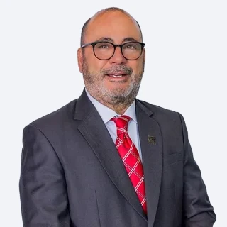 Portrait of Dr. Joe Nespral, Chief Strategy Officer & EVP